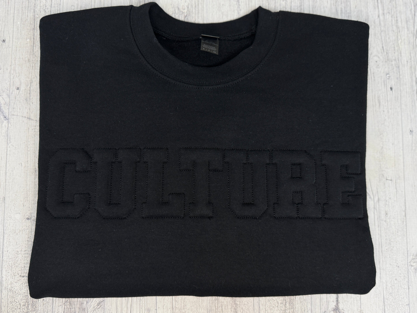 Culture Embossed Sweatshirt